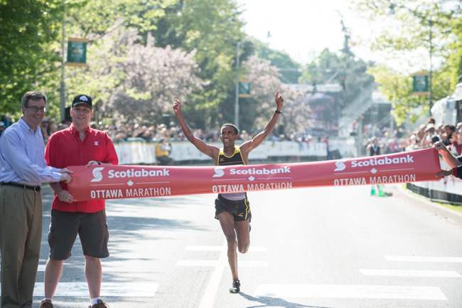 Ethiopian marathoner crossing the finish line
