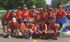 Members of the Extra Mile Crew are ready to help runners.