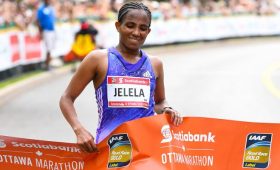 Koren Jelela crosses the 2016 Ottawa Marathon finish line