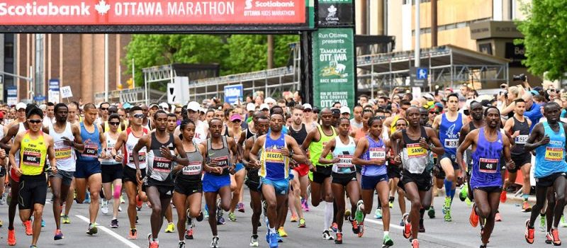 Runners take off at the 2016 Scotiabank Ottawa Marathon start line