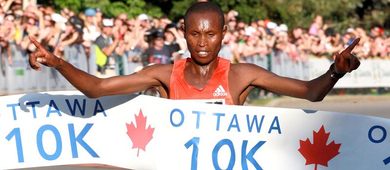 Geoffrey Mutai crosses the finish line in the 2012 Ottawa 10K