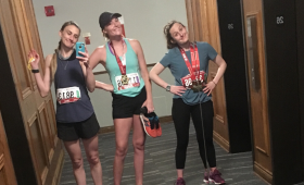 Jackie McIver, Lauren Ryder, and Alex Sullivan show off their 2019 Tamarack Ottawa Race Weekend medals